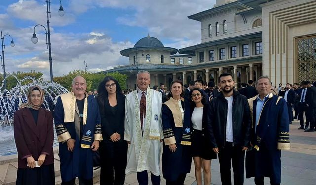 EBYÜ Yönetimi Cumhurbaşkanı Erdoğan'ın da katıldığı törende...