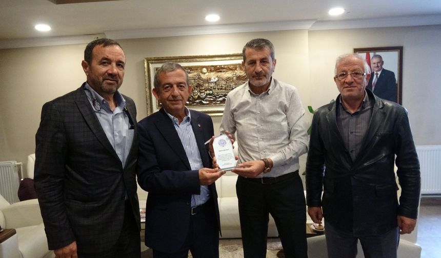 Tanoğlu’ndan Ticaret Dünyasının Tanınan Ailesine Anlamlı Plaket